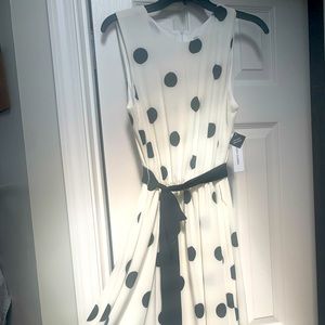 Creme colored dress with black polka dots and belt
